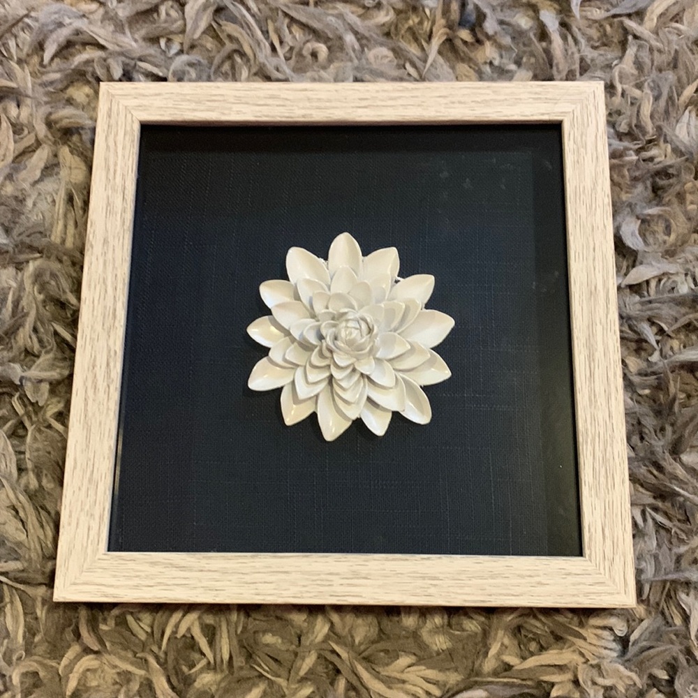 Flower in wooden frame